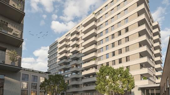 Impressie van TAC living, met twee appartement gebouwen en een grasveld, klik voor een vergroting
