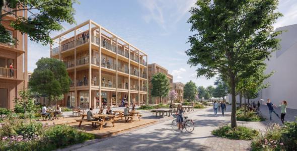 Impressie van het plein, met zicht op woningen en een café. (Foto: VenhoevenCS Architectuur + Stedenbouw)