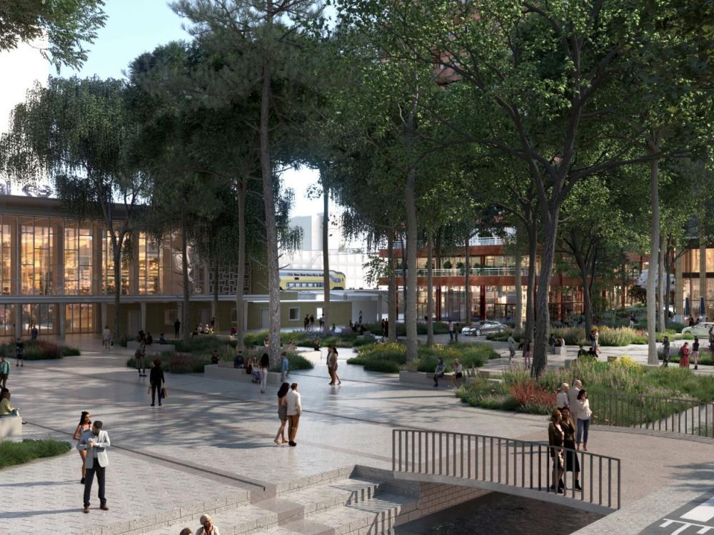 Artist impressie van nieuwe Stationsplein met bomen en water